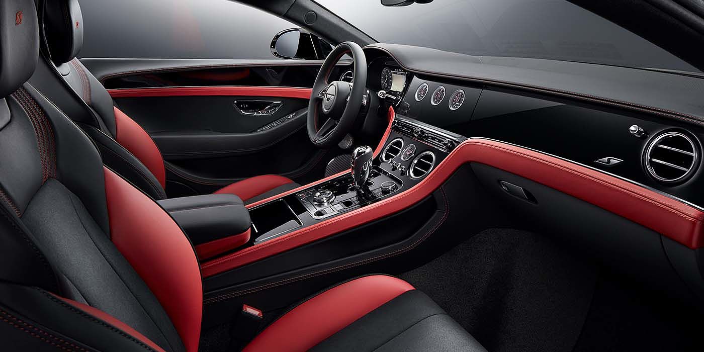 Bentley Knokke Bentley Continental GT S coupe front interior in Beluga black and Hotspur red hide with high gloss Carbon Fibre veneer
