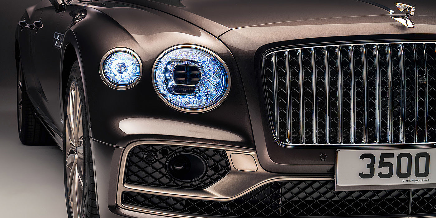 Bentley Knokke Bentley Flying Spur Odyssean sedan front grille and illuminated led lamps with Brodgar brown paint