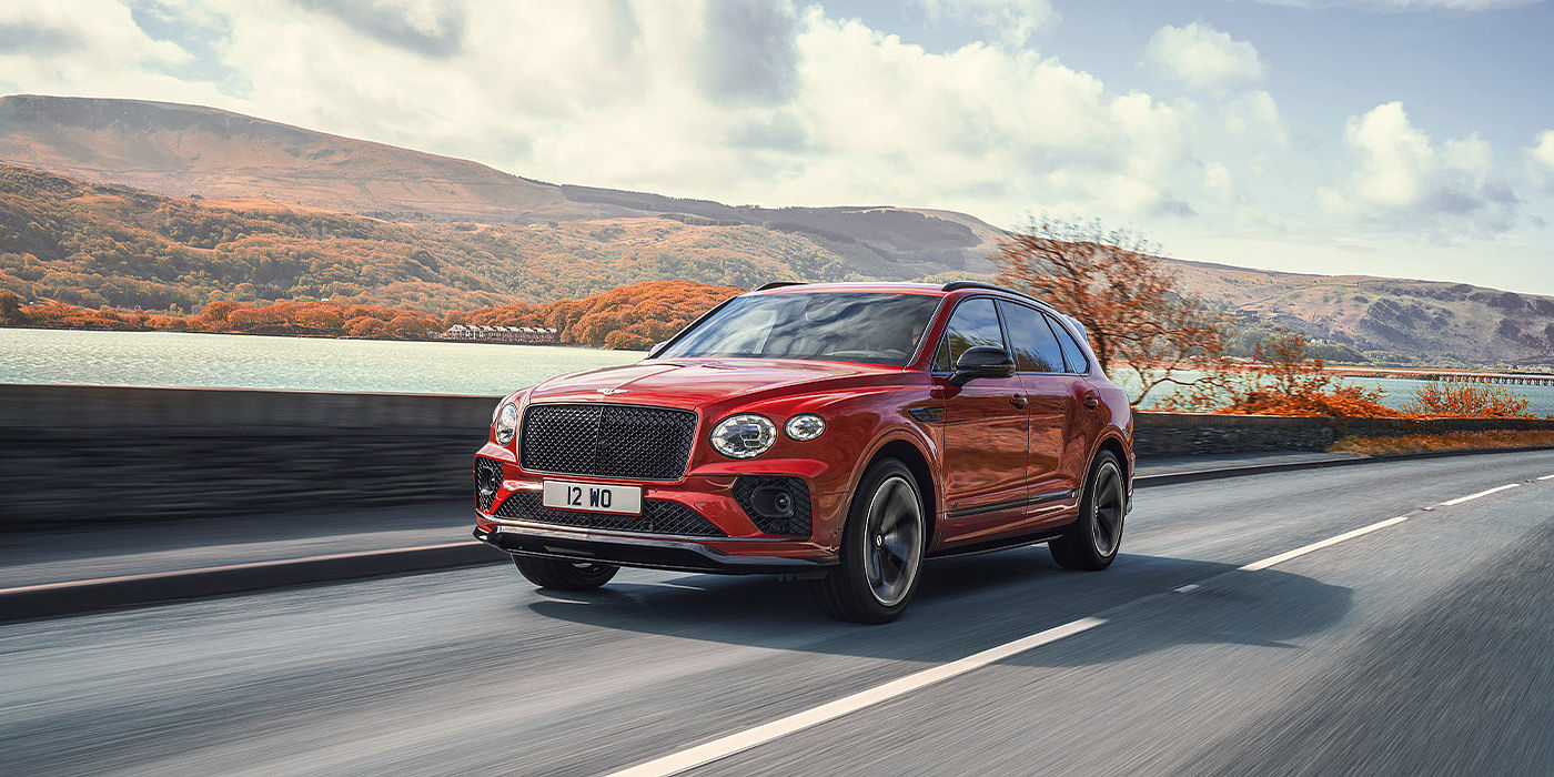 Bentley Knokke Bentley Bentayga S SUV in Candy Red paint front 34 dynamic