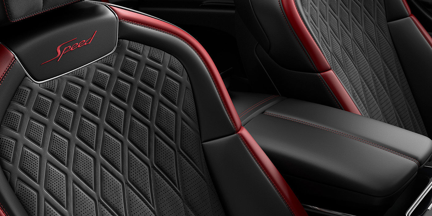 Bentley Knokke Bentley Flying Spur Speed sedan seat stitching detail in Beluga black and Cricket Ball red hide