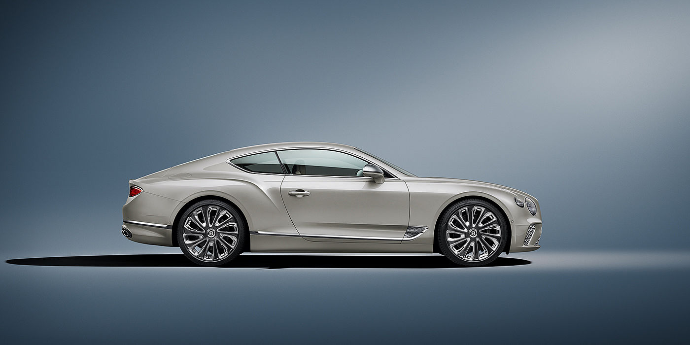 Bentley Knokke Bentley Continental GT Mulliner coupe in White Sand paint front 34
