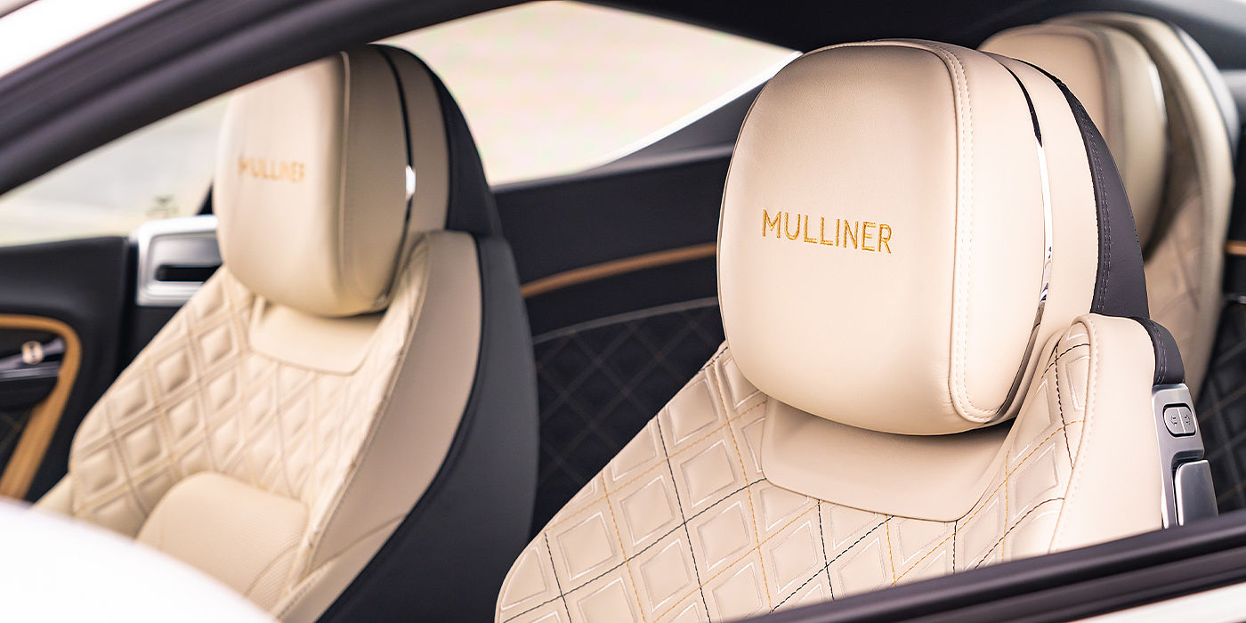 Bentley Knokke Bentley Continental GT Mulliner coupe seat detail in Beluga black and Linen hide